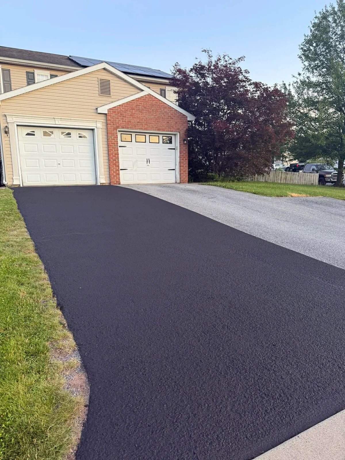 Refreshed asphalt driveway after sealcoating restoration in Lebanon County